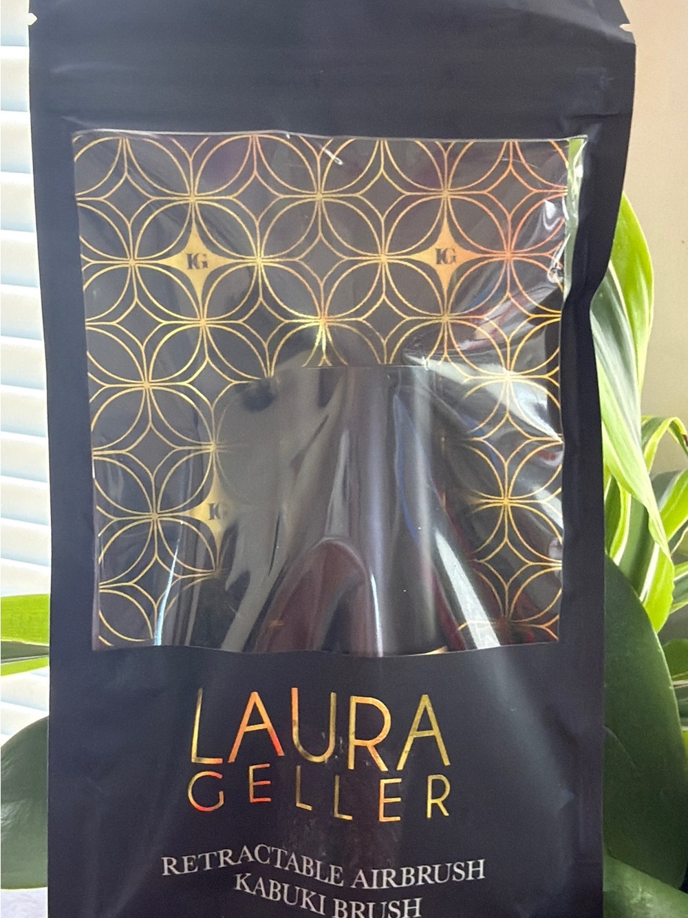 Laura Geller Black Cosmetic Pouch with Gold Accent Window